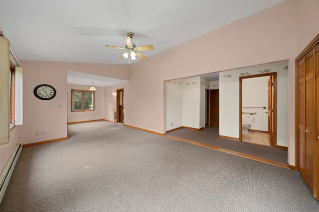 a view of a livingroom with a ceiling fan