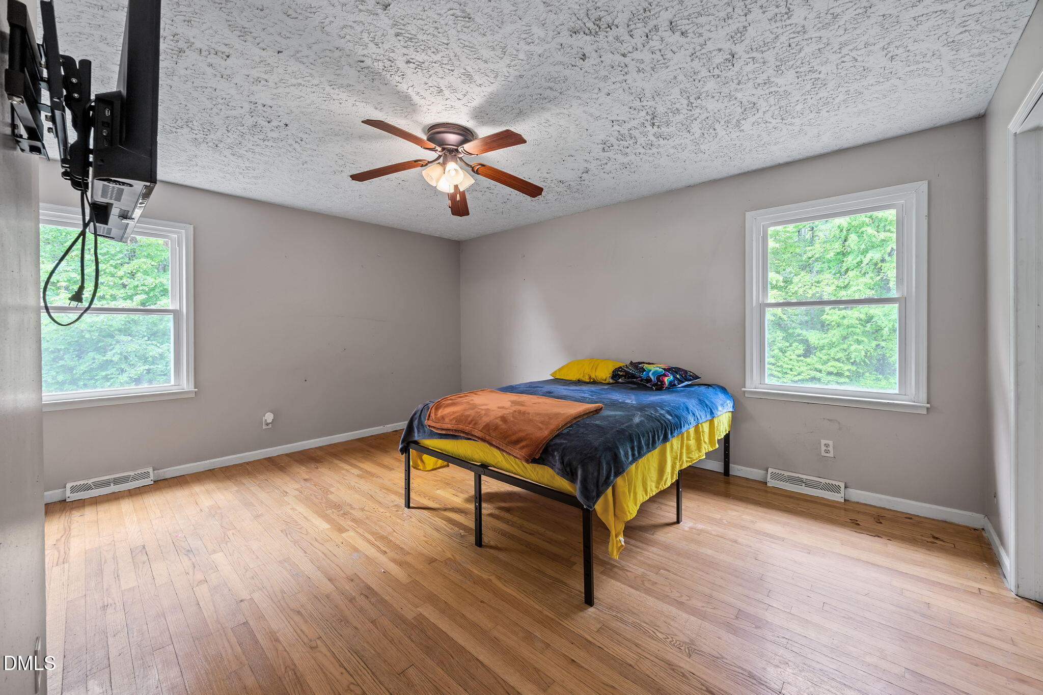 786 Dick Holeman Road Timberlake, NC 27583 - Photo 23 of 44 a bedroom with a bed and a window