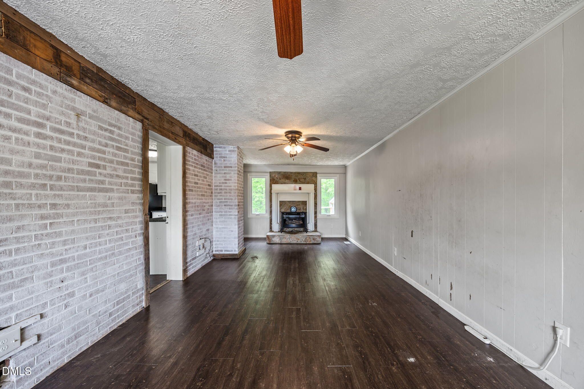 786 Dick Holeman Road Timberlake, NC 27583 - Photo 32 of 44 wooden floor in an empty room with a window