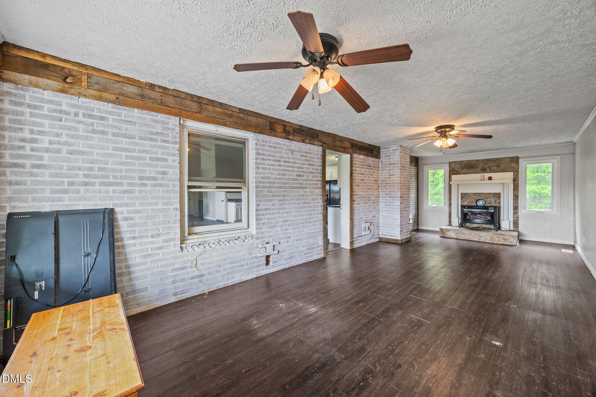 786 Dick Holeman Road Timberlake, NC 27583 - Photo 33 of 44 a view of livingroom with hardwood floor and a ceiling fan