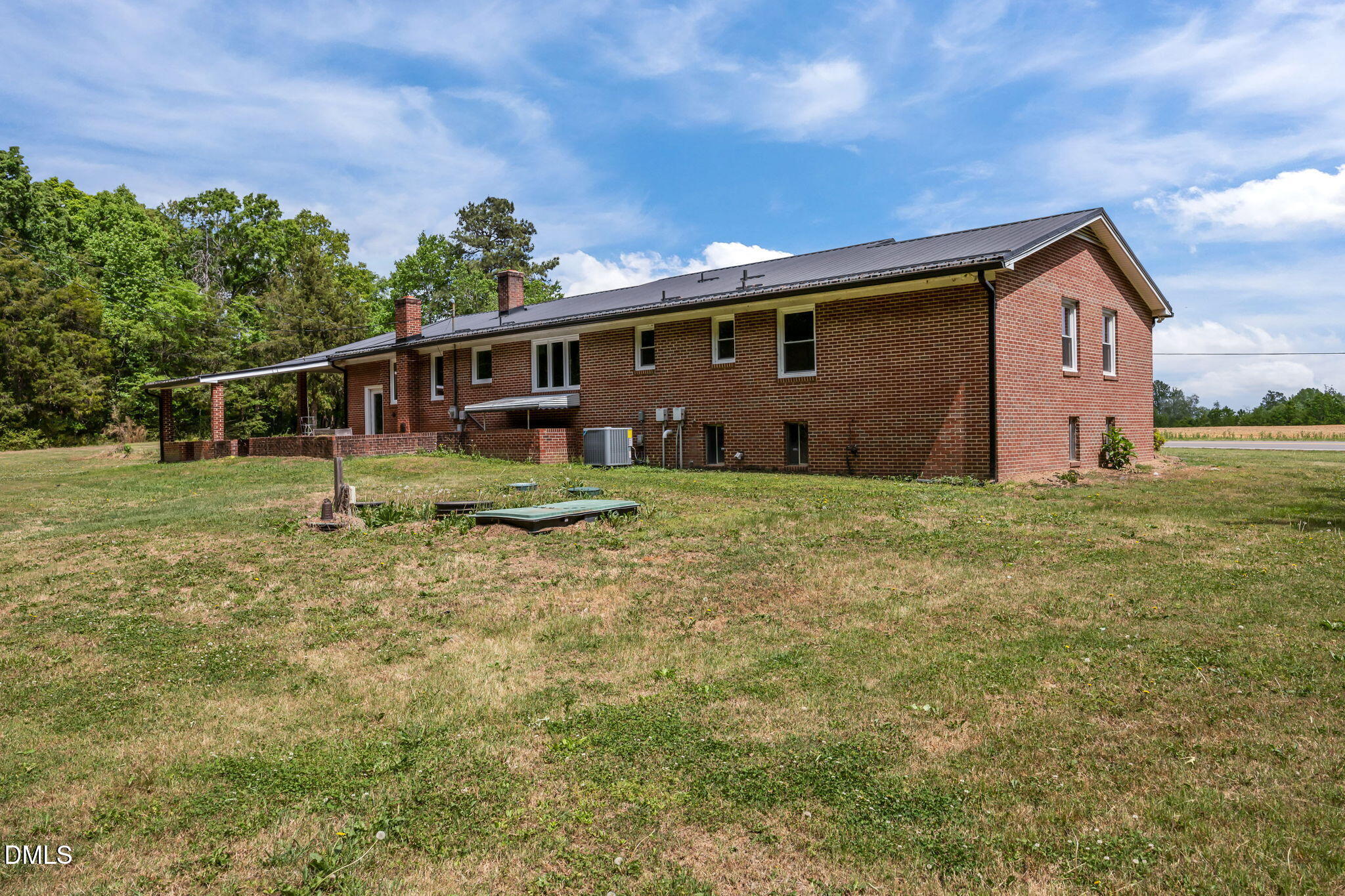 786 Dick Holeman Road Timberlake, NC 27583 - Photo 41 of 44 a front view of a house with garden