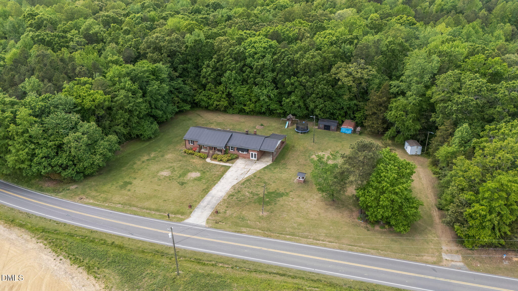 786 Dick Holeman Road Timberlake, NC 27583 - Photo 5 of 44 a view of a garden from a balcony