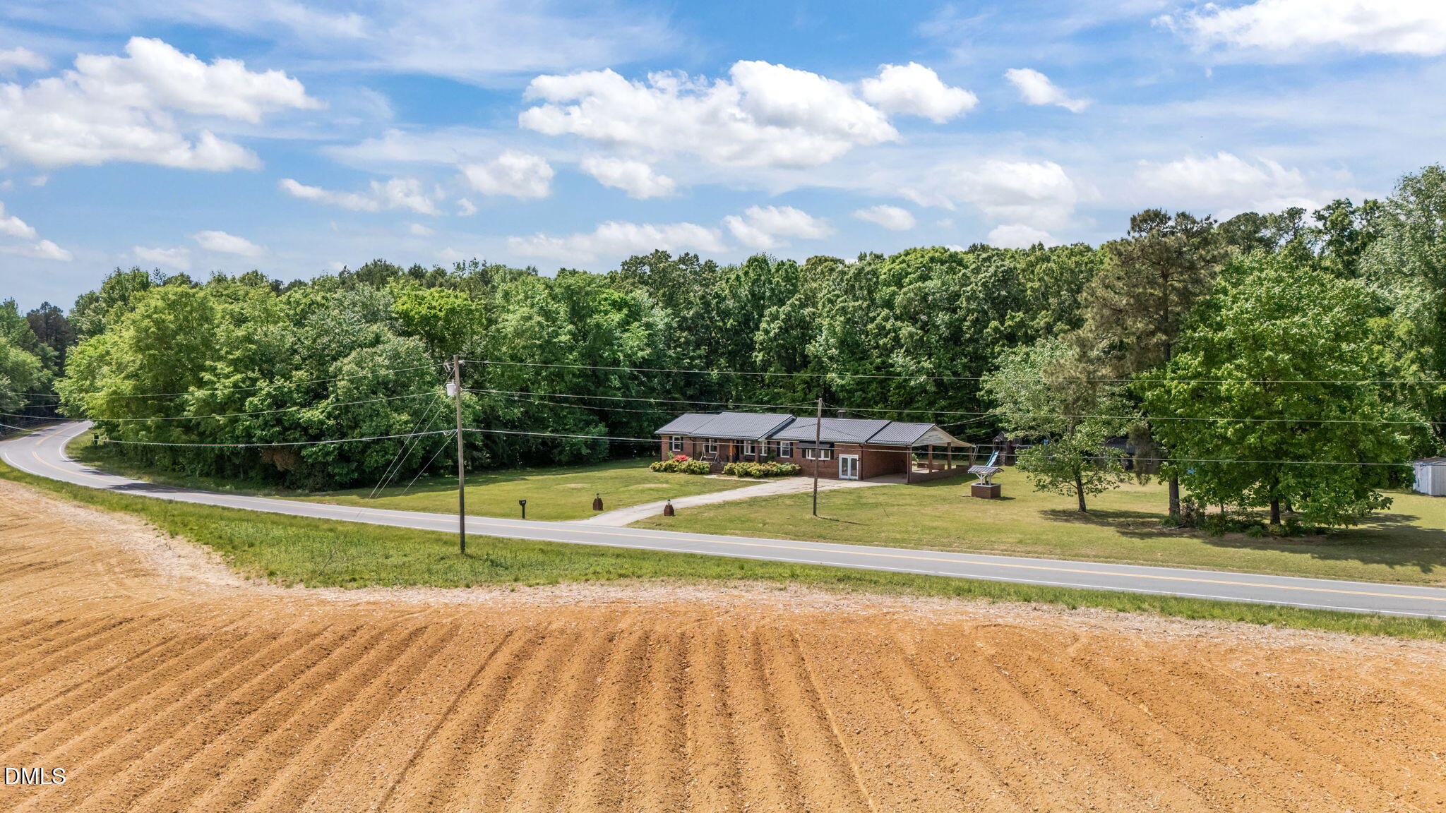 786 Dick Holeman Road Timberlake, NC 27583 - Photo 6 of 44 a view of a playground with basketball court