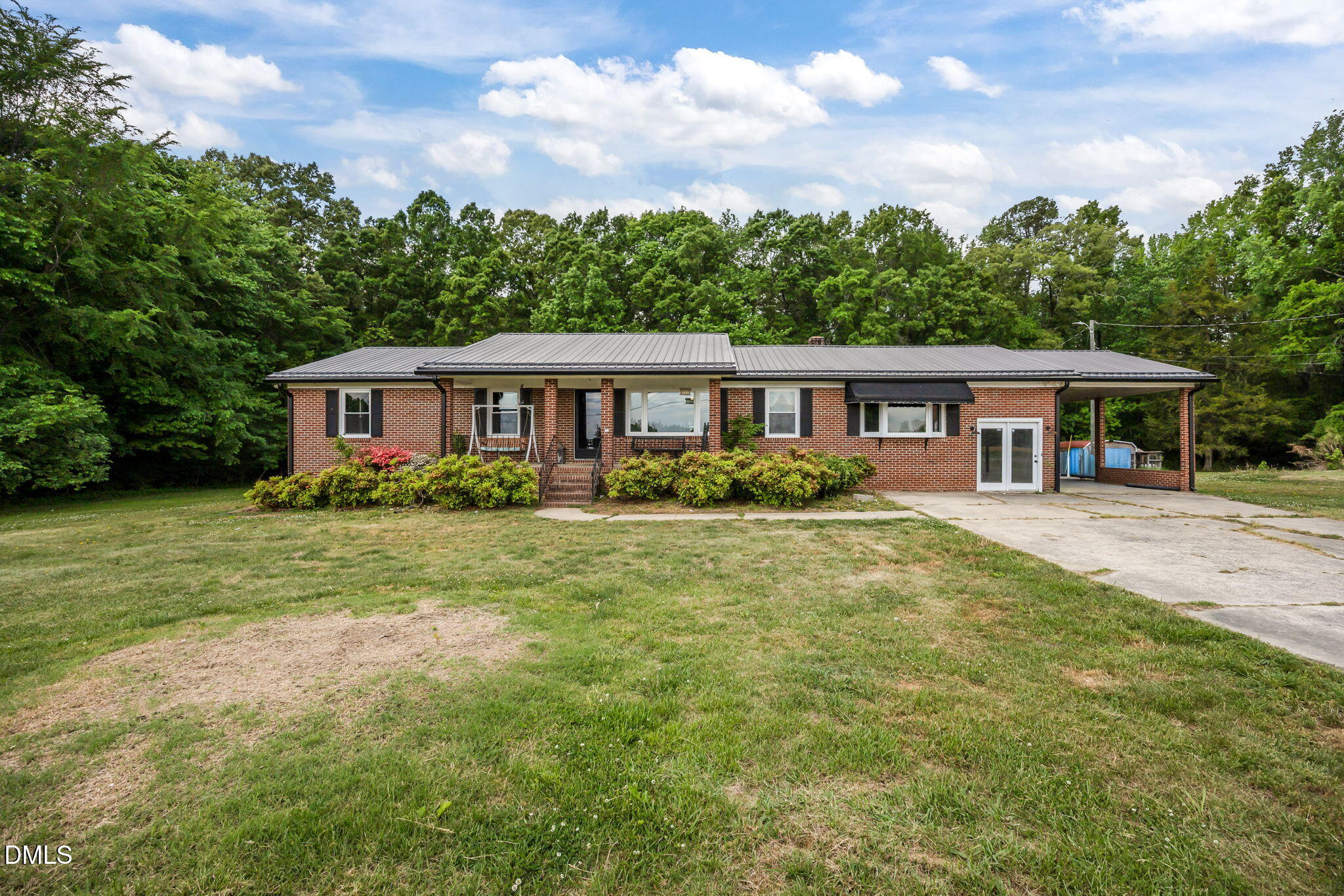 786 Dick Holeman Road Timberlake, NC 27583 - Photo 8 of 44 a view of a house with a yard