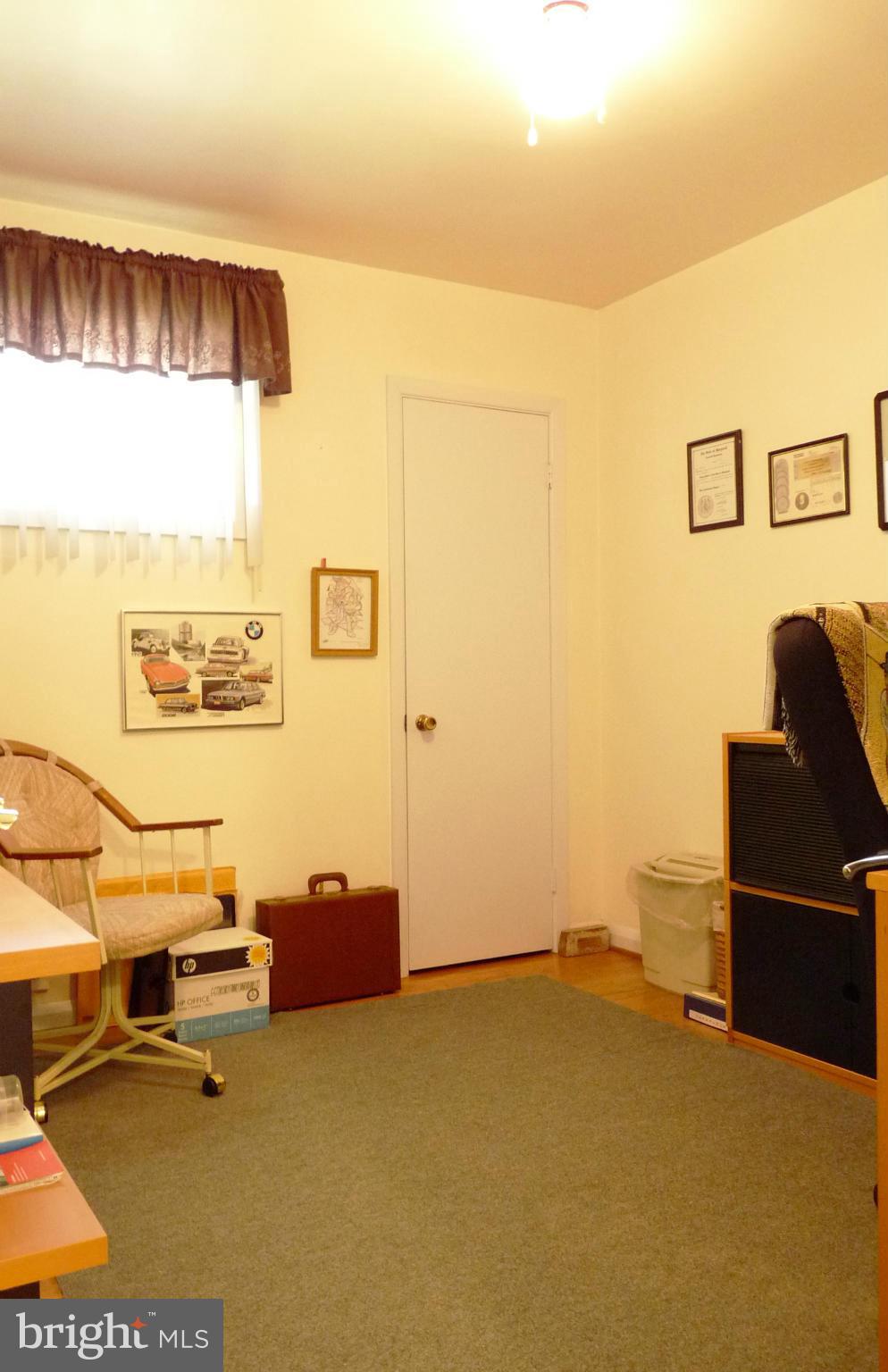 1812 Willann Road Baltimore, MD 21237 - Photo 12 of 26 a view of a room with workspace and a window