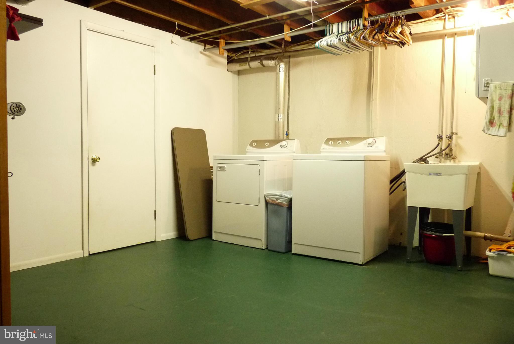 1812 Willann Road Baltimore, MD 21237 - Photo 20 of 26 a utility room with dryer and washer