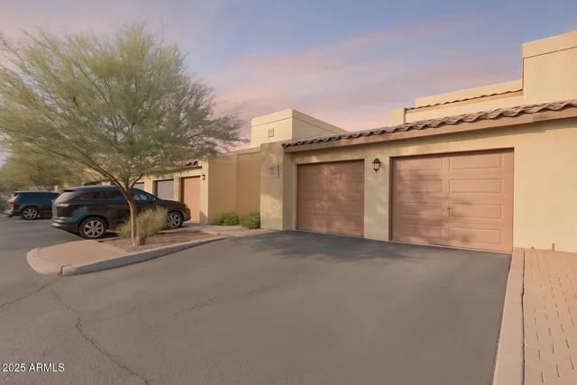a view of parking area and car parked