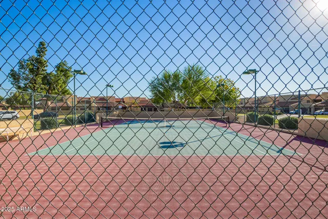 a close up of a and white fence