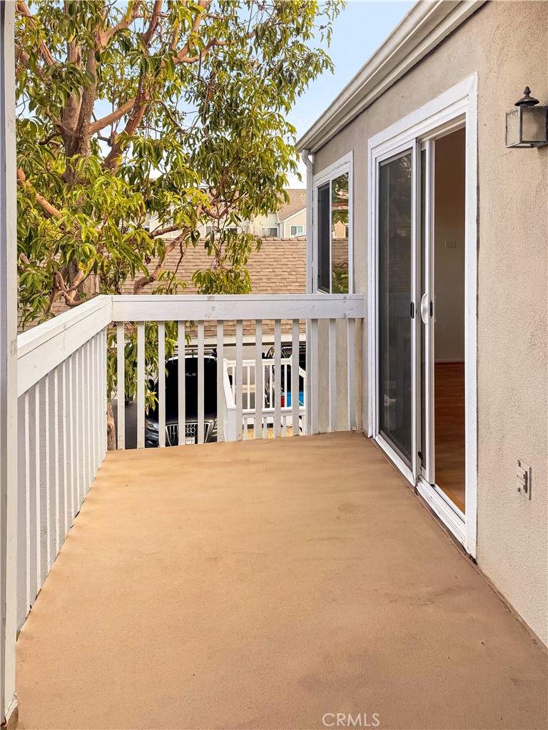 34110 Selva Road, Unit 323 Dana Point, CA 92629 - Photo 3 of 21 a view of a house with a trees in front of it