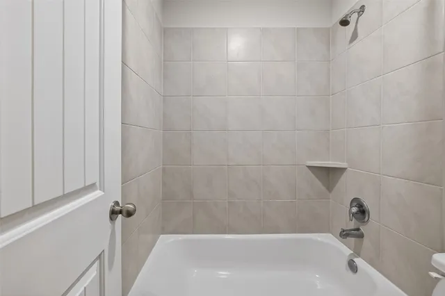 a bathroom with a bathtub