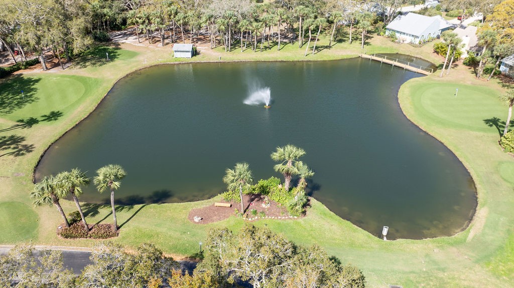 5740 Marina Drive, Unit 2 Sebastian, FL 32958 - Photo 18 of 24 a view of a dining table with wooden floor