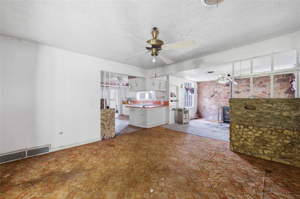3722 North 27th Street Waco, TX 76708 - Photo 11 of 20 a view of a kitchen with a sink and cabinets