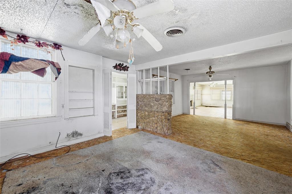 3722 North 27th Street Waco, TX 76708 - Photo 13 of 20 a view of empty room with cabinet and ceiling fan