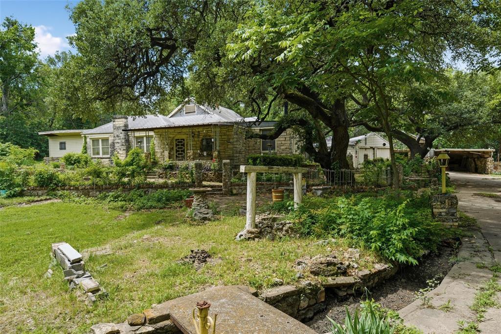 3722 North 27th Street Waco, TX 76708 - Photo 2 of 20 a backyard of a house with yard barbeque oven and outdoor seating