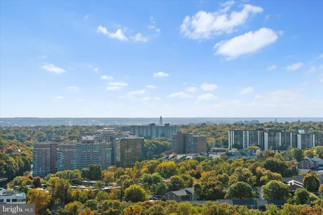 a view of parking garage with cars parked