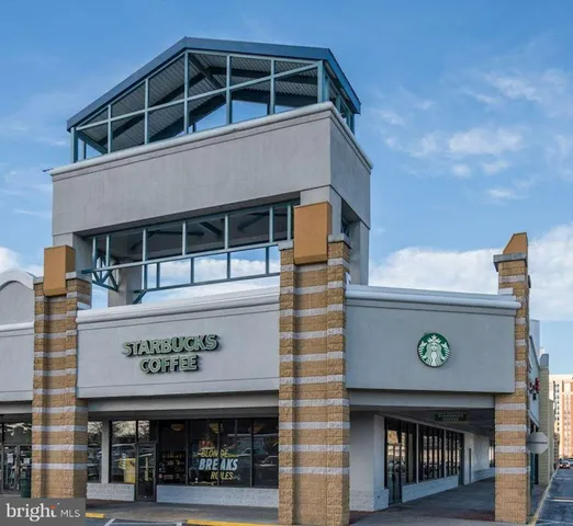 a view of a street with cars