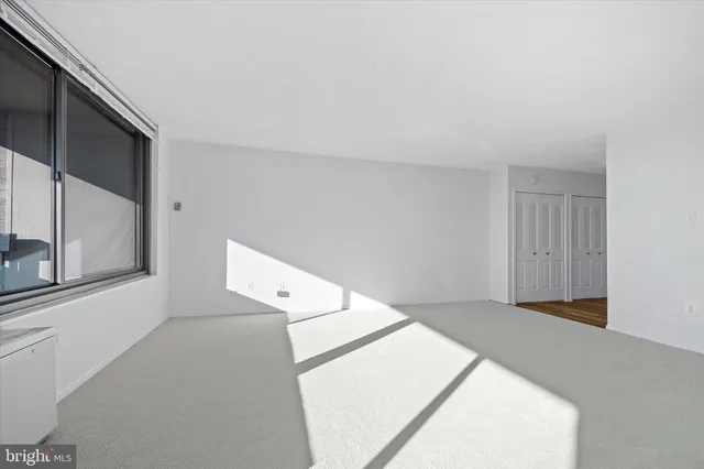 a view of a room with a window