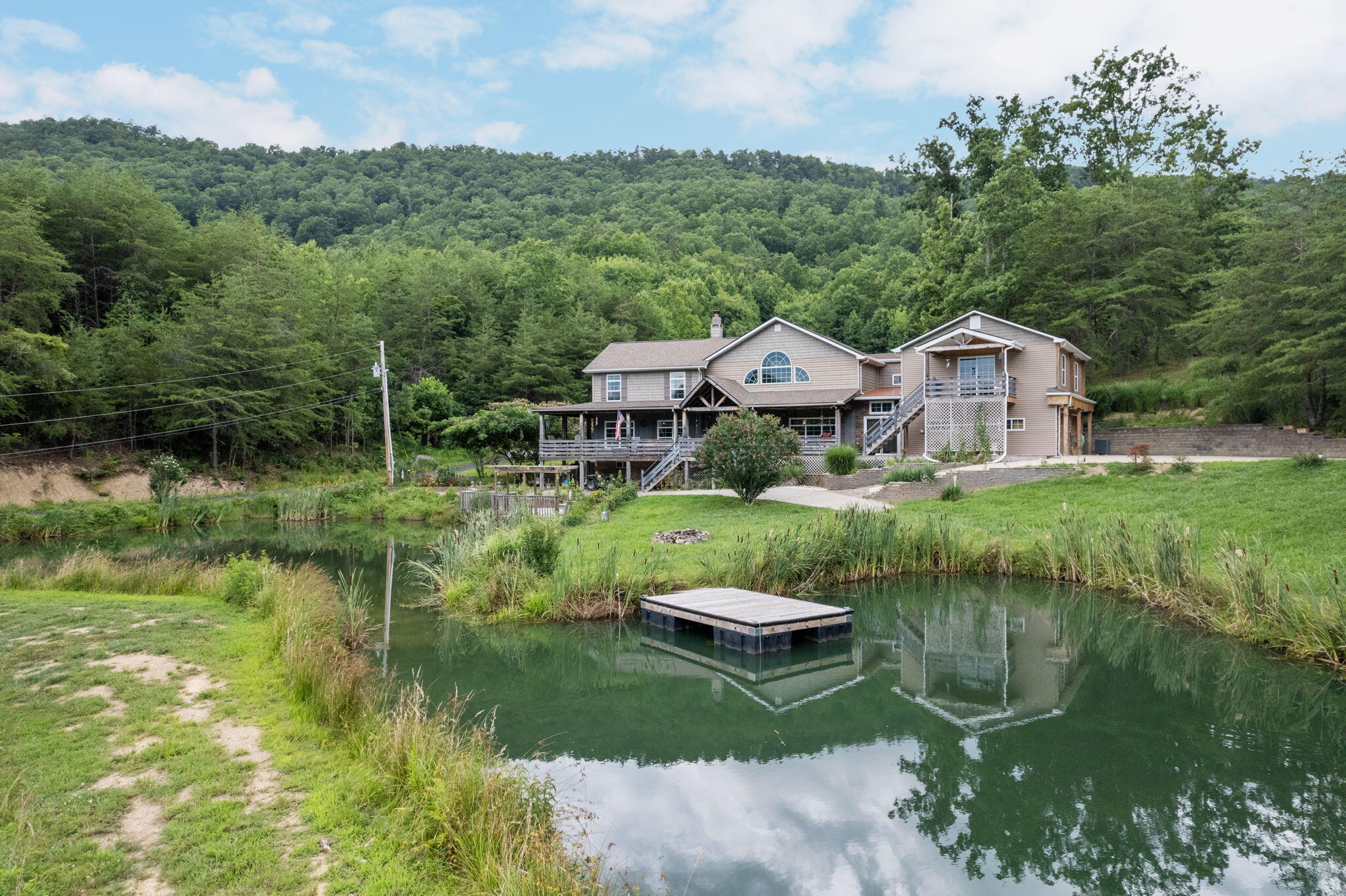 731 East Snowflake Road Surgoinsville, TN 37873 - Photo 2 of 53 46-web-or-mls-DJI_0384