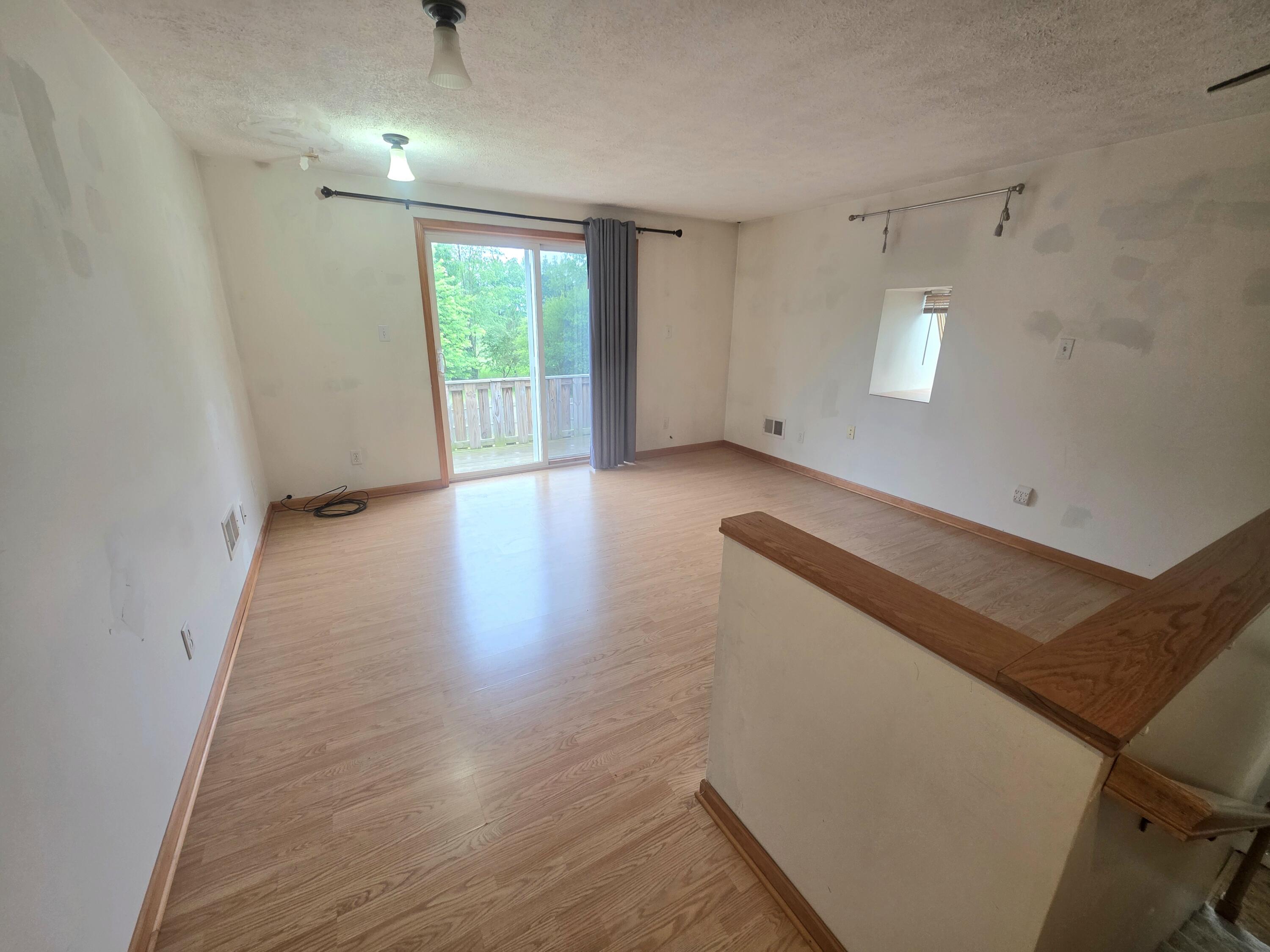1402 Deaner Road Northeast Edmore, MI 48829 - Photo 7 of 17 Upper Living Area