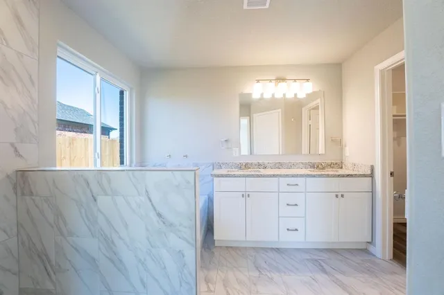 a bathroom with a bathtub