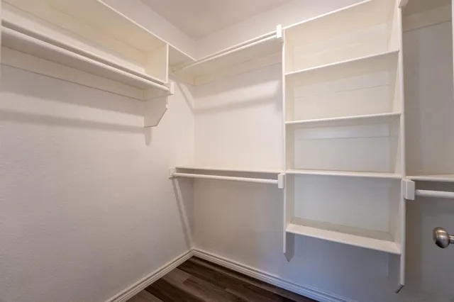 a house with trees in the background