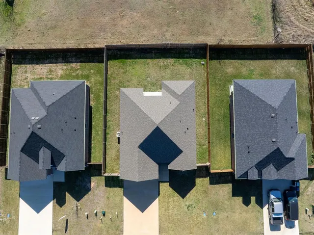 a bathroom with a sink mirror and vanity