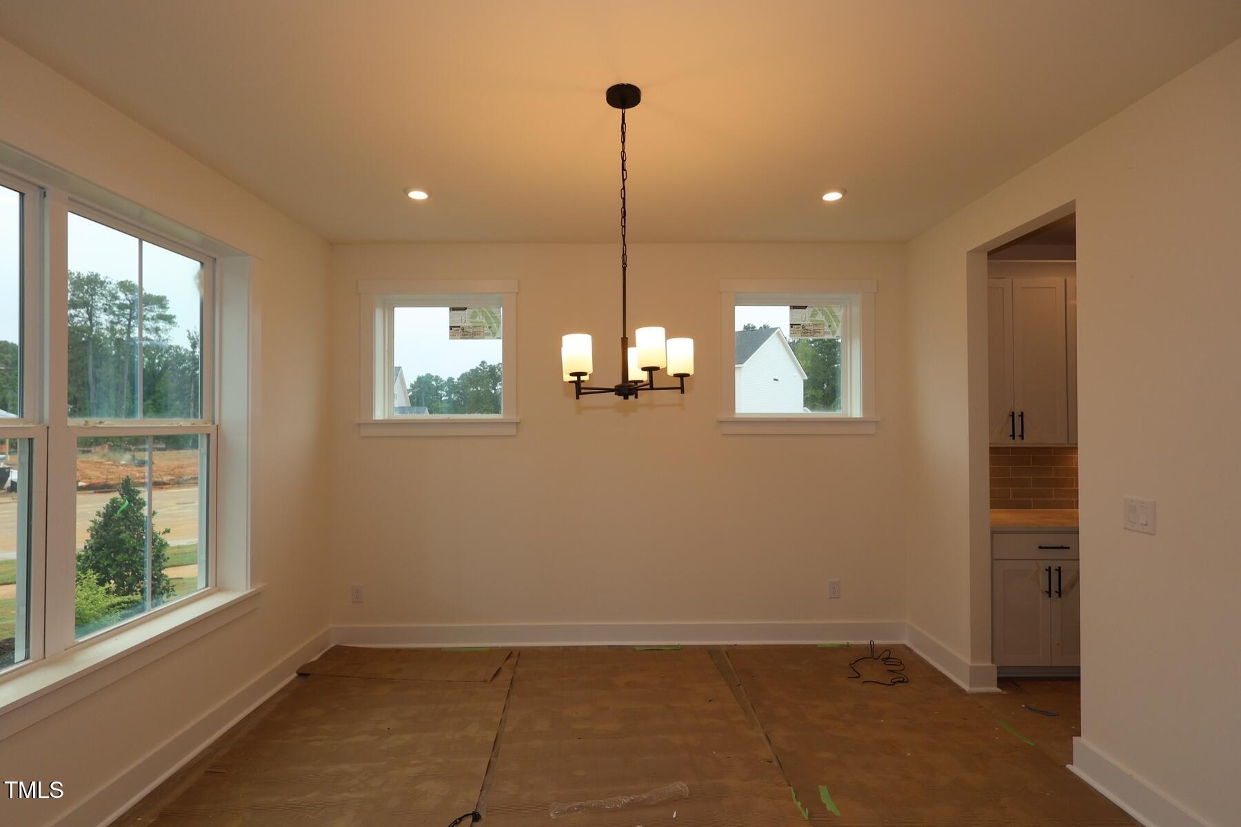 1124 Opal Lane, Unit 88 Durham, NC 27705 - Photo 11 of 27 a view of a room that has a window in it