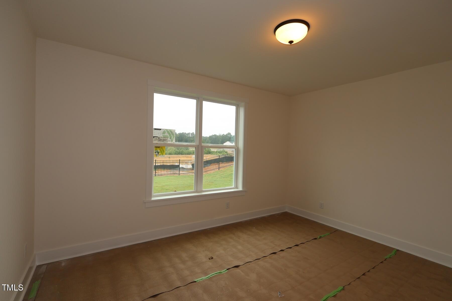 1124 Opal Lane, Unit 88 Durham, NC 27705 - Photo 14 of 27 an empty room with a window