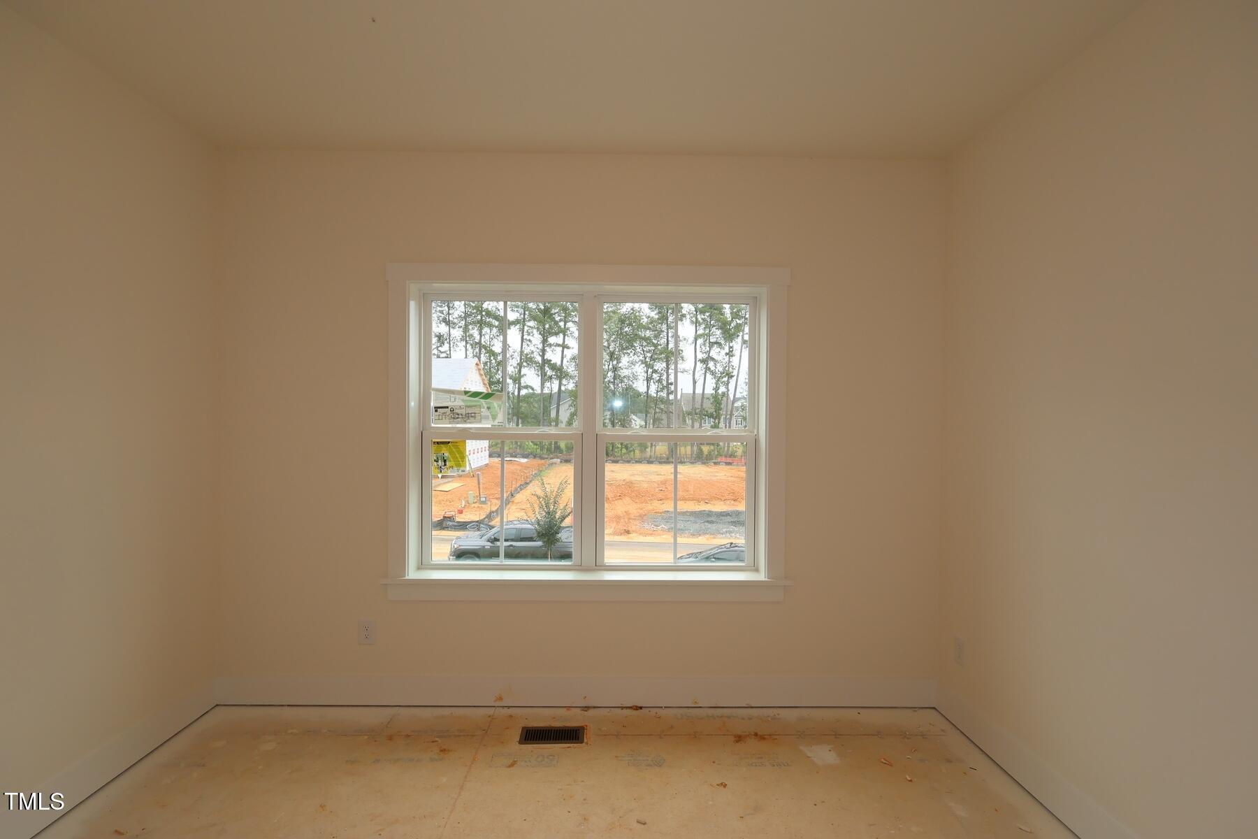 1124 Opal Lane, Unit 88 Durham, NC 27705 - Photo 23 of 27 an empty room with a window