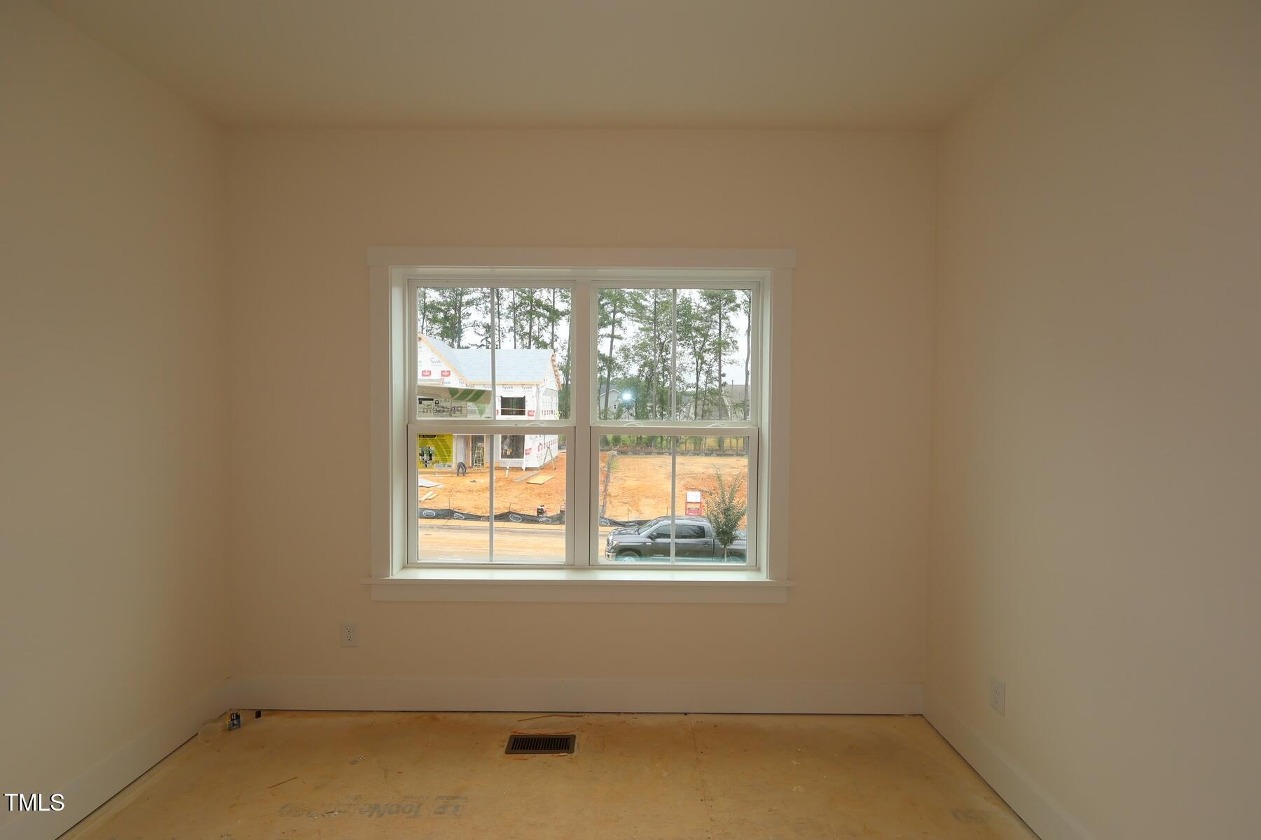1124 Opal Lane, Unit 88 Durham, NC 27705 - Photo 24 of 27 an empty room with a window