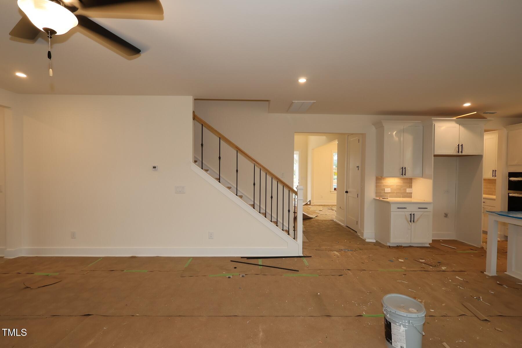 1124 Opal Lane, Unit 88 Durham, NC 27705 - Photo 9 of 27 a view of a kitchen with refrigerator and white stove top oven