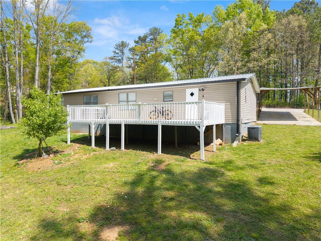 1670 Azelea Lane Gainesville, GA 30507 - Photo 30 of 33 a view of a house with a yard