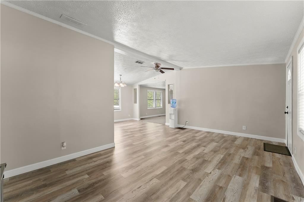 1670 Azelea Lane Gainesville, GA 30507 - Photo 6 of 33 wooden floor in an empty room