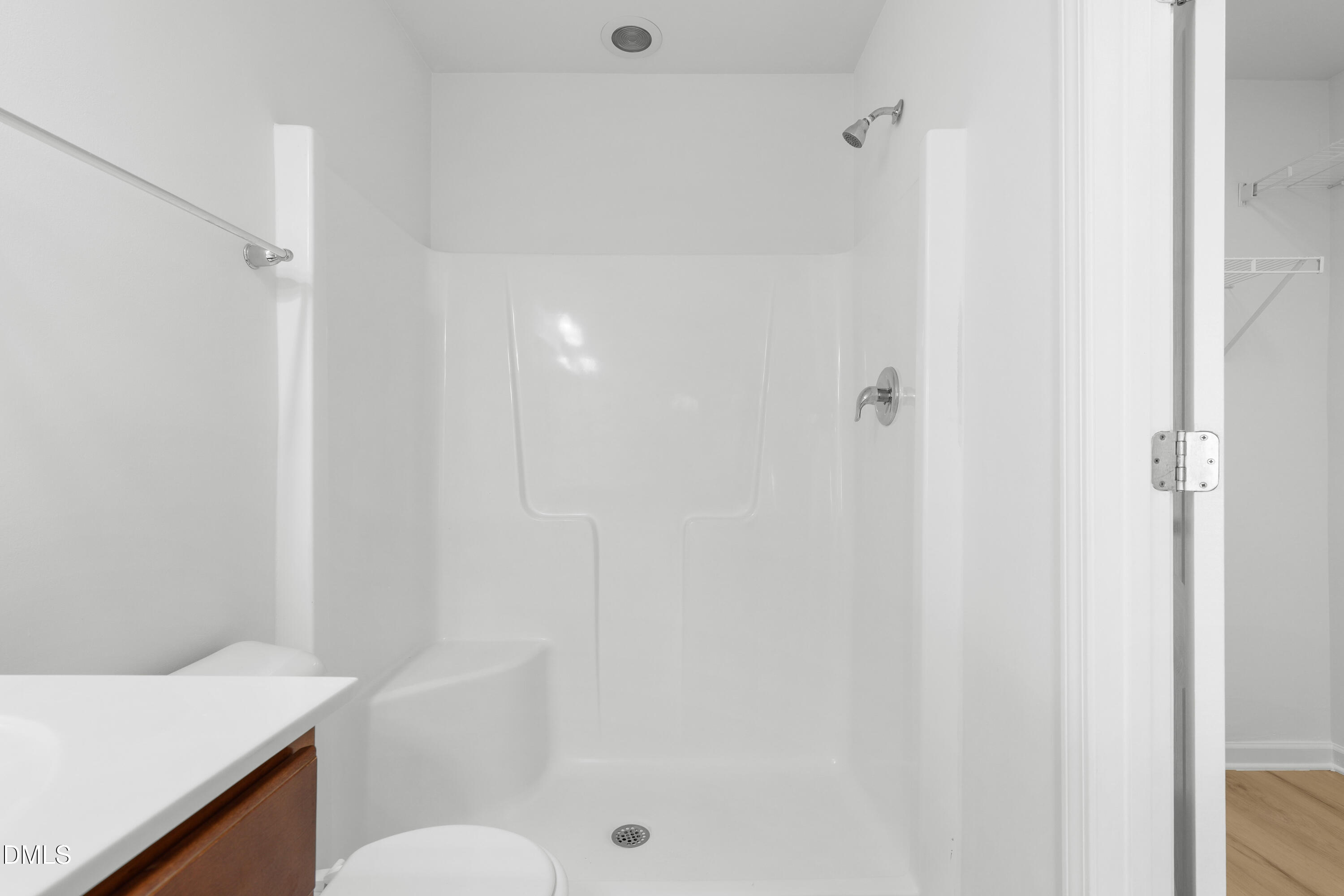 4400 Hillsgrove Road Wake Forest, NC 27587 - Photo 24 of 49 a bathroom with a sink a toilet and shower