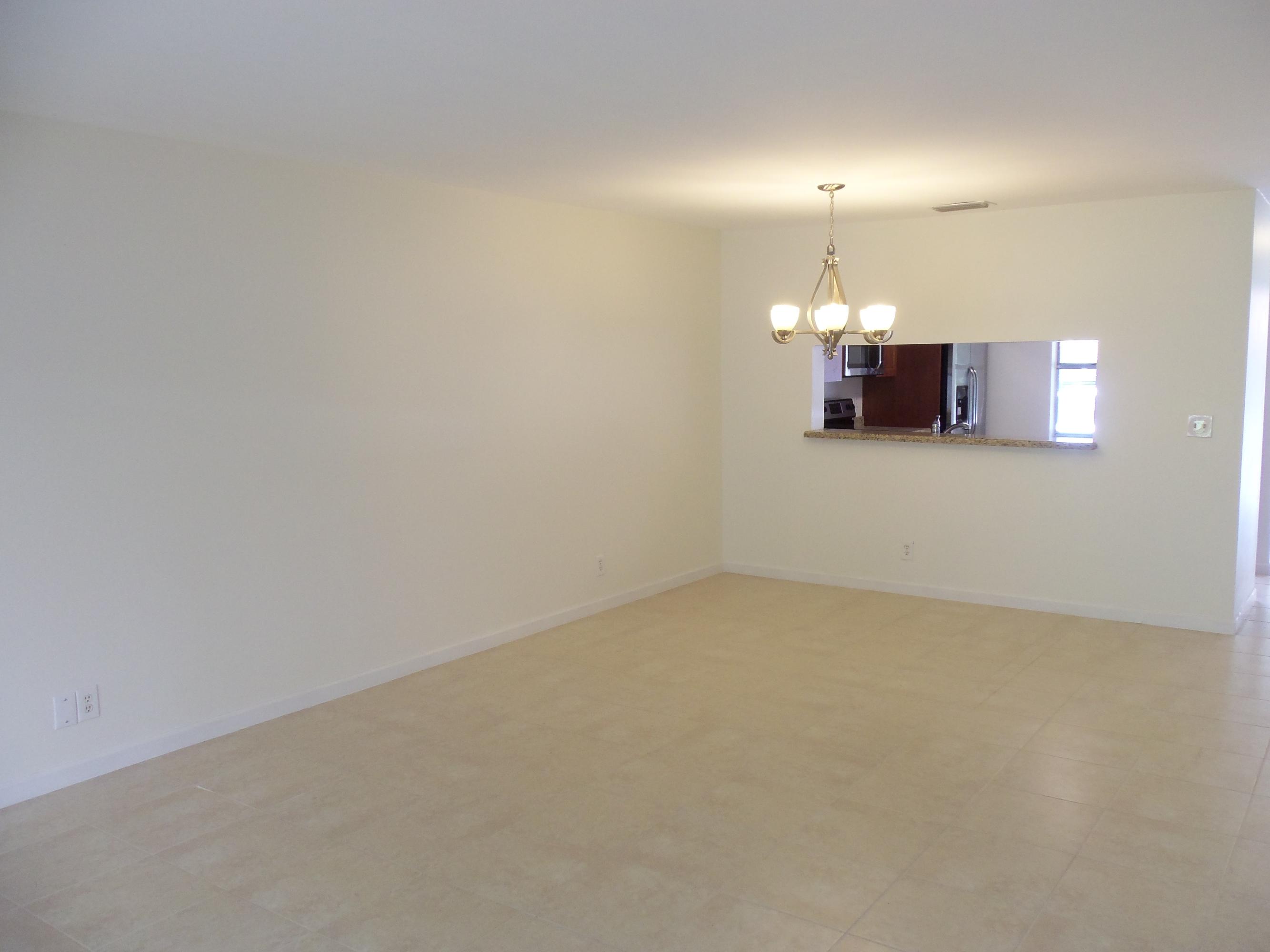 6429 Boca Circle Boca Raton, FL 33433 - Photo 9 of 27 DINING AREA W/PASS THROUGH TO KITCHEN