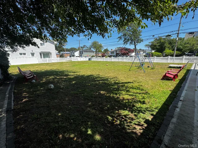 a view of a field with an trees
