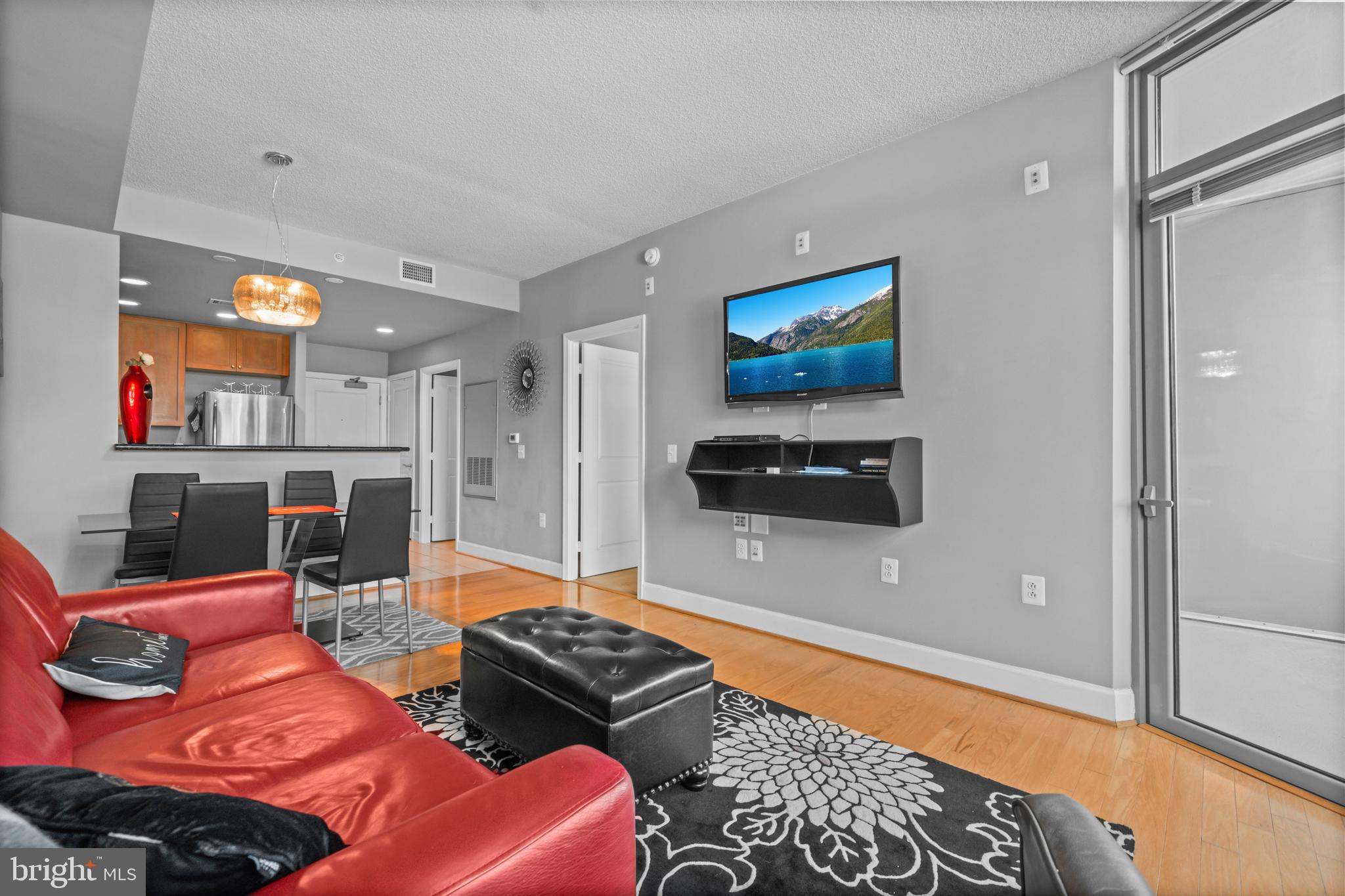 3600 South Glebe Road, Unit 215W Arlington, VA 22202 - Photo 11 of 33 a living room with furniture and a flat screen tv