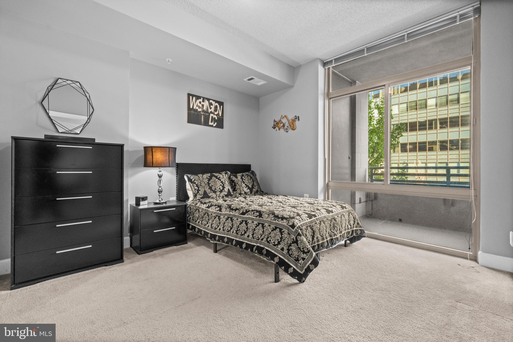 3600 South Glebe Road, Unit 215W Arlington, VA 22202 - Photo 13 of 33 a bedroom with a bed and with furniture