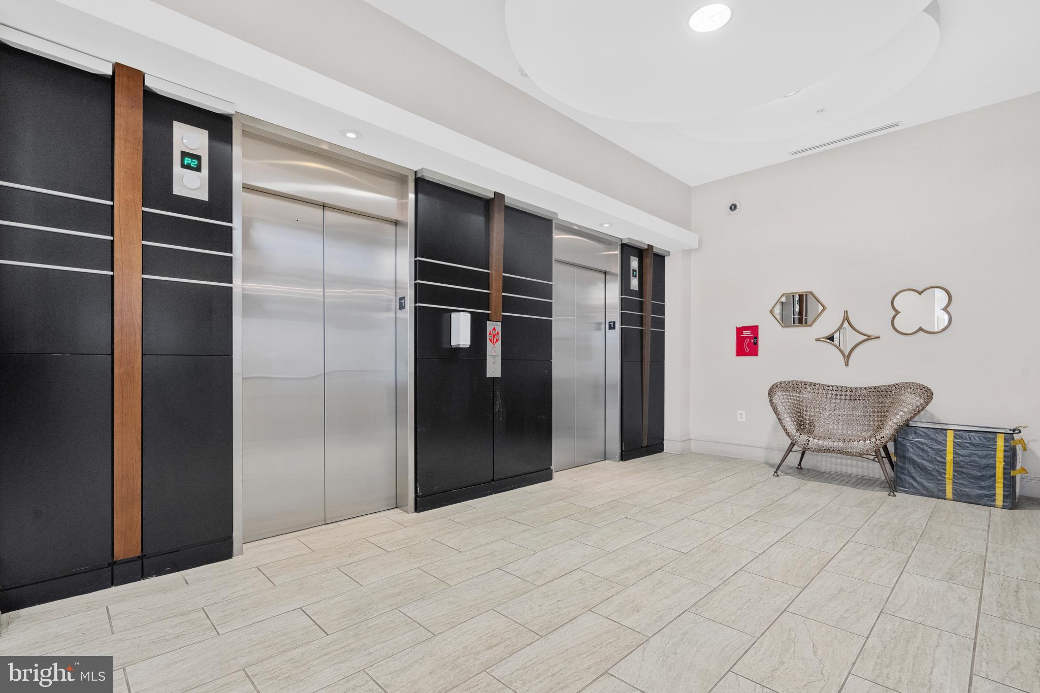 3600 South Glebe Road, Unit 215W Arlington, VA 22202 - Photo 19 of 33 a bedroom with a bed and a table