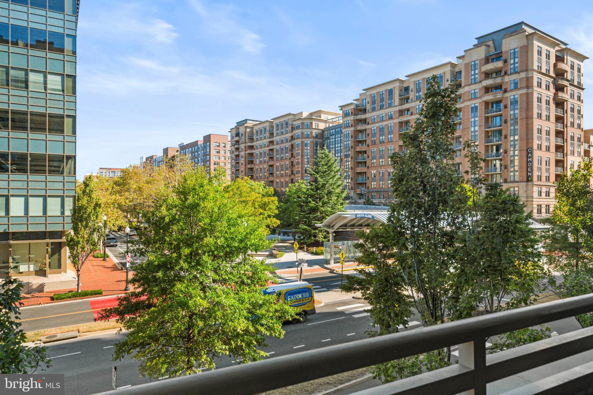 3600 South Glebe Road, Unit 215W Arlington, VA 22202 - Photo 9 of 33 a view of a building with lot of plants and trees