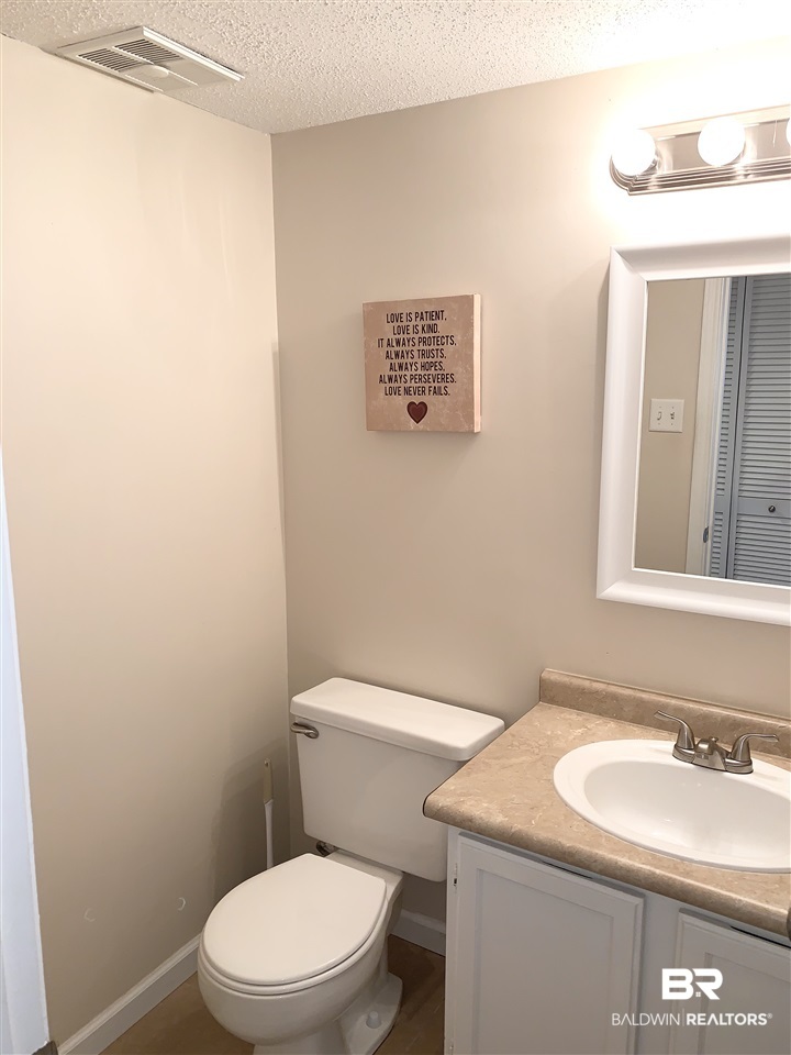 6701 Dickens Ferry Road, Unit 64 Mobile, AL 36608 - Photo 10 of 27 Downstairs Half Bath