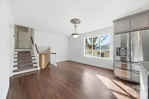 a bathroom with a shower and a toilet