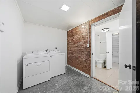 a view of a balcony with wooden floor