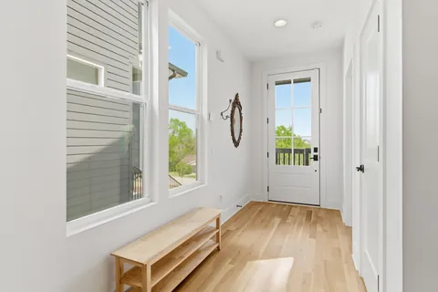 view of room with window and wooden floor