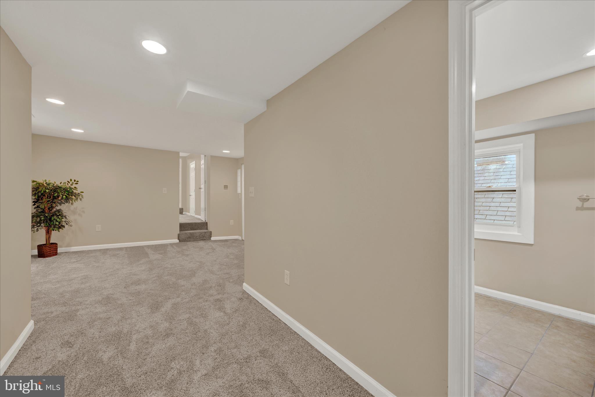 8511 Frederick Road Ellicott City, MD 21043 - Photo 17 of 36 a view of hallway with livingroom
