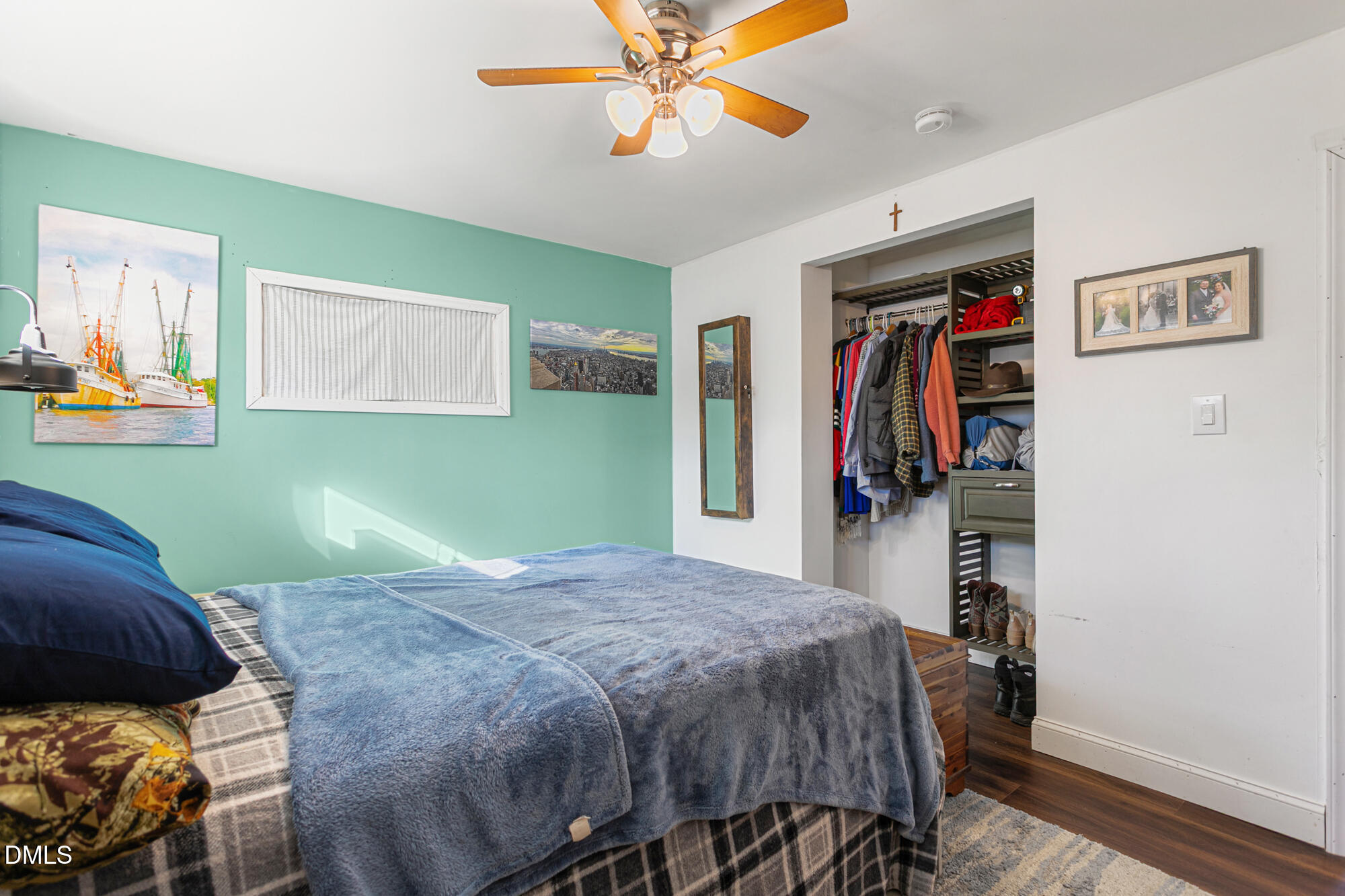 4244 Alamance Church Road Liberty, NC 27298 - Photo 16 of 37 a bedroom with a bed and a bookshelf
