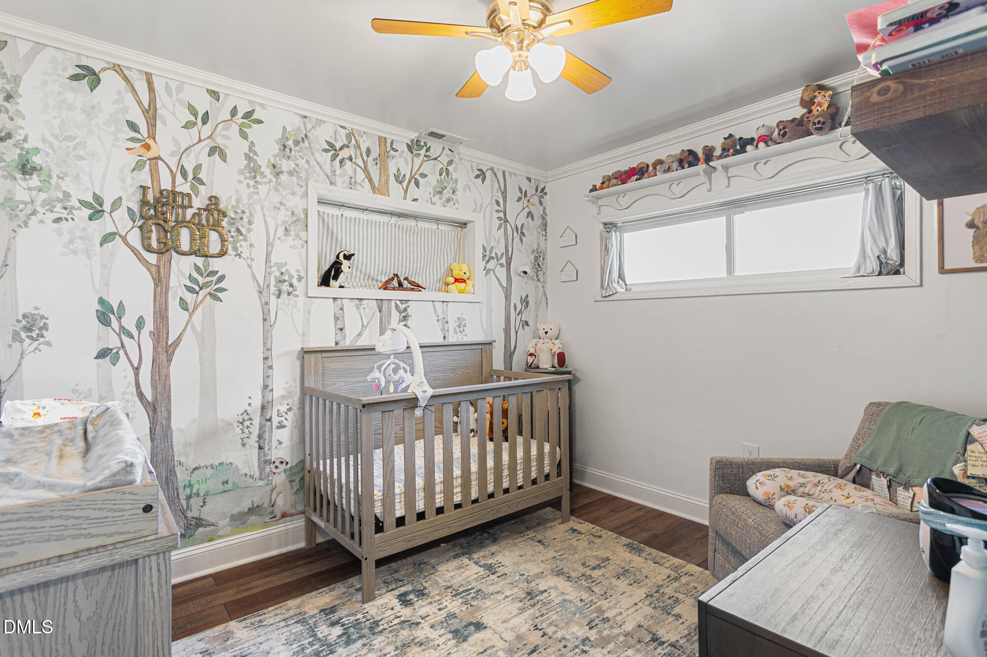 4244 Alamance Church Road Liberty, NC 27298 - Photo 18 of 37 a view of a bedroom with furniture and wooden floor
