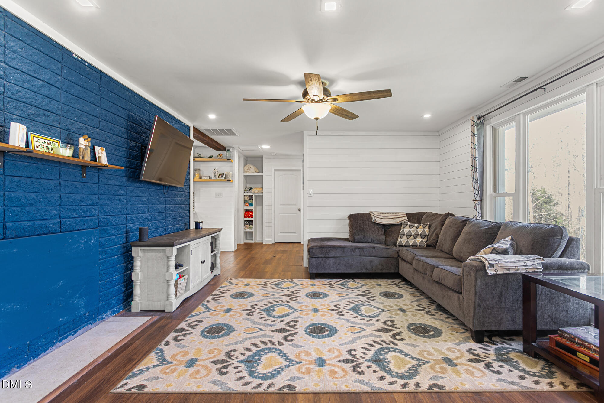 4244 Alamance Church Road Liberty, NC 27298 - Photo 2 of 37 a living room with furniture and a rug