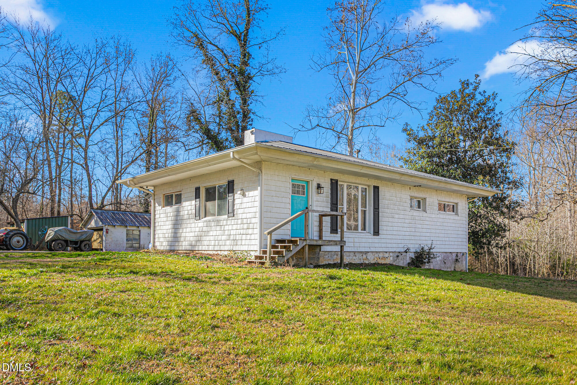 4244 Alamance Church Road Liberty, NC 27298 - Photo 21 of 37 a view of a house with a yard