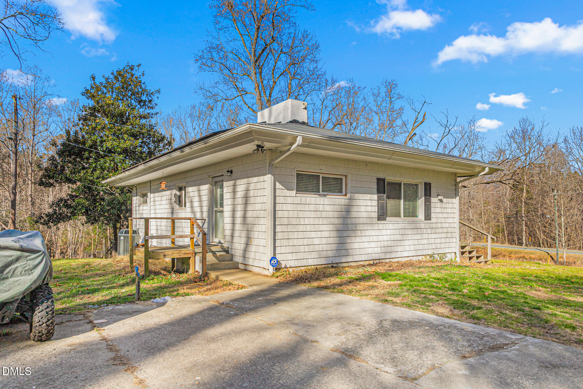 4244 Alamance Church Road Liberty, NC 27298 - Photo 23 of 37 a front view of a house with a yard